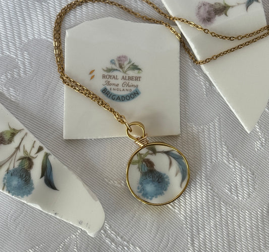 Necklace with floral pendant on a Royal Albert card