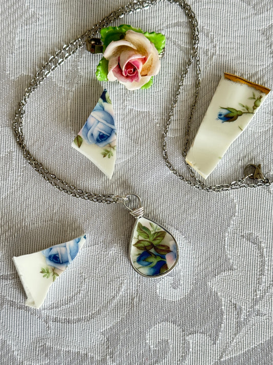 teardrop pendant with blue rose and leaves