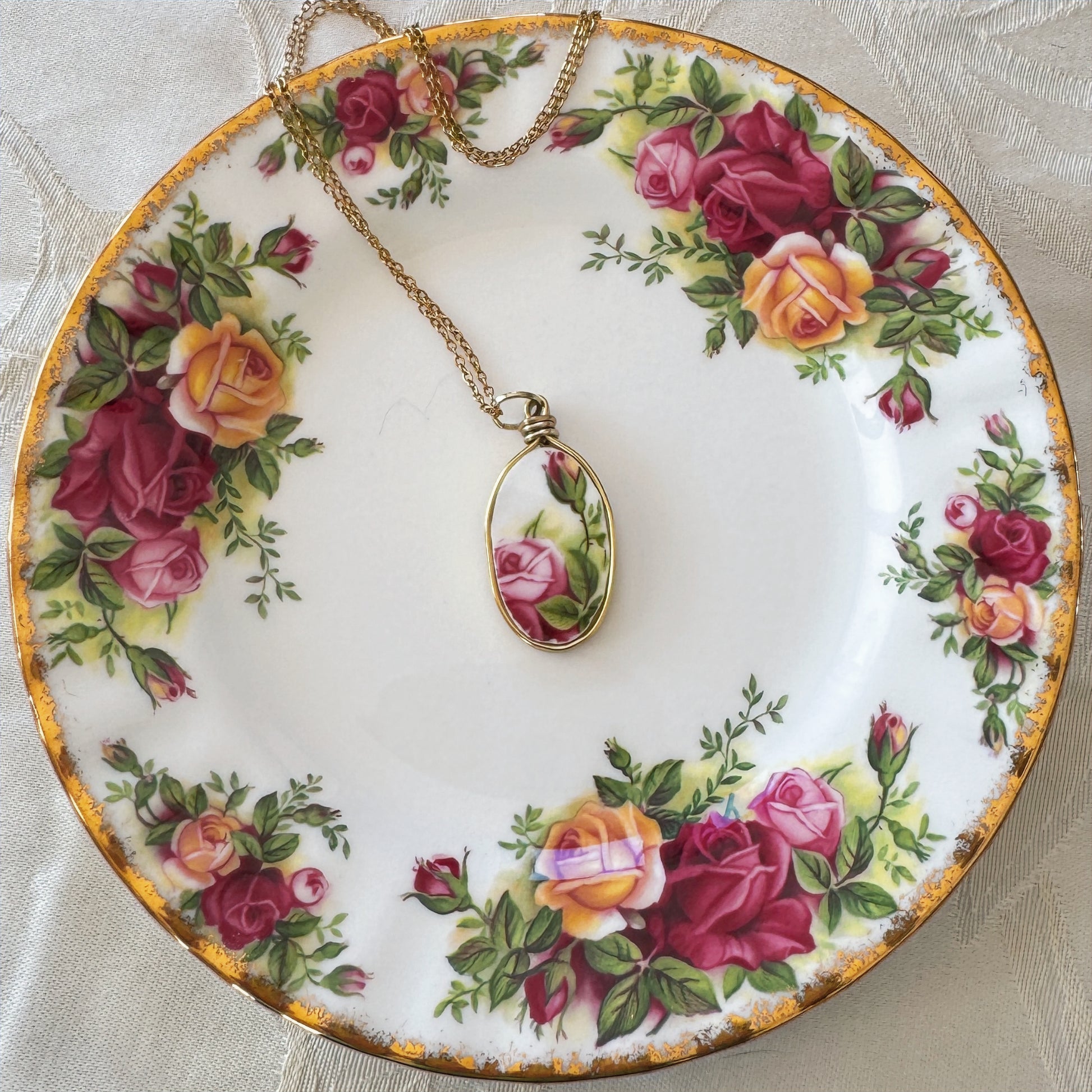 Old Country Rosependant on plate